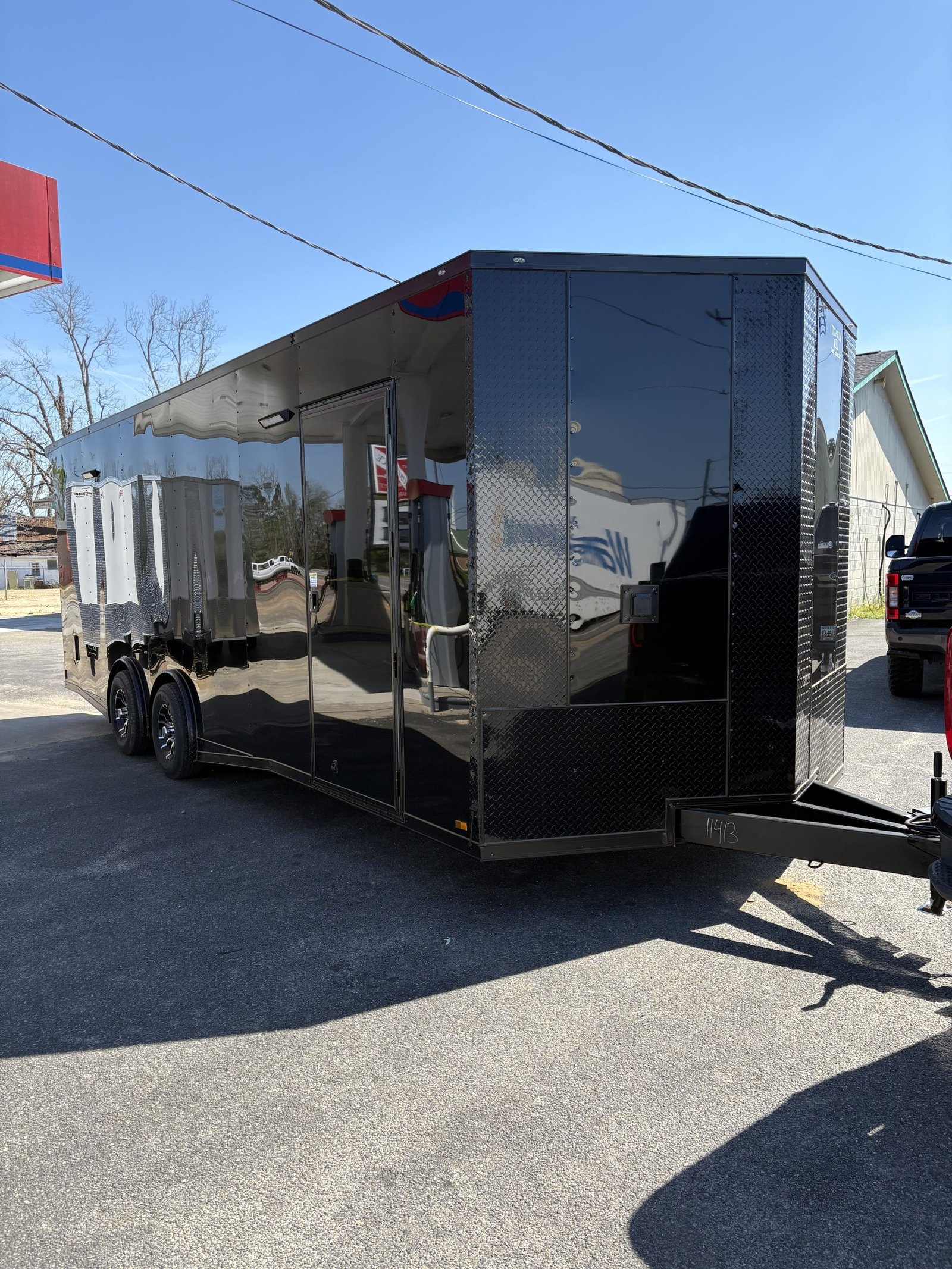 8.5x24 Titanium Cargo Black Blackout Enclosed Race Trailer for Sale